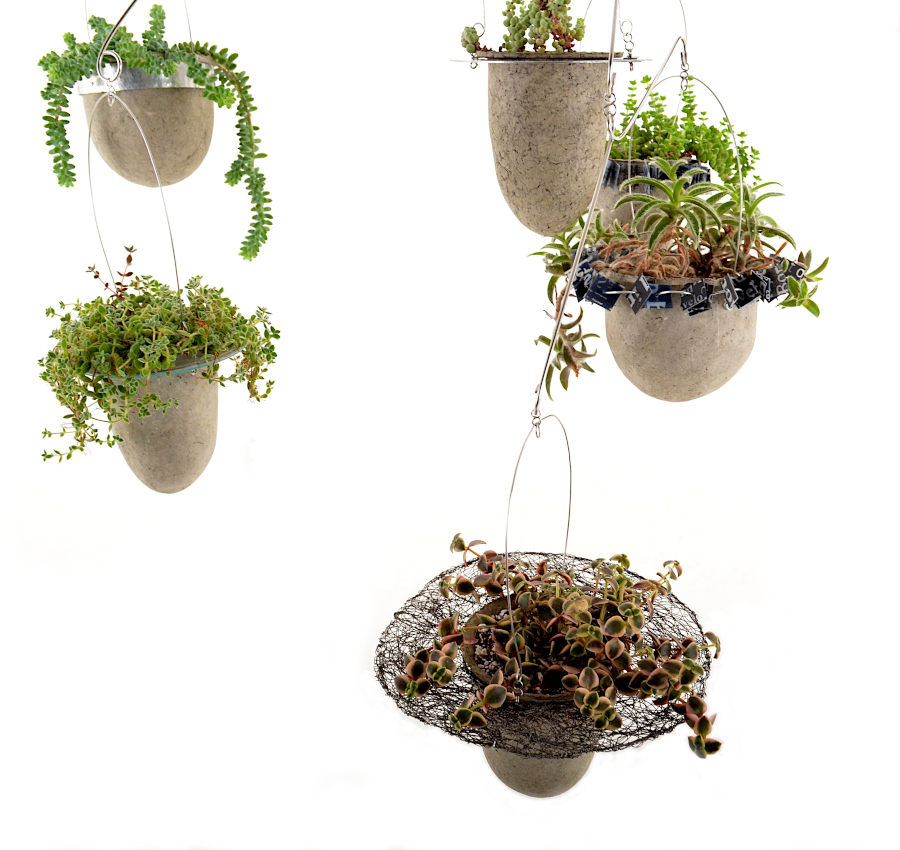 Suspended vessels with plants as mobile sculpture